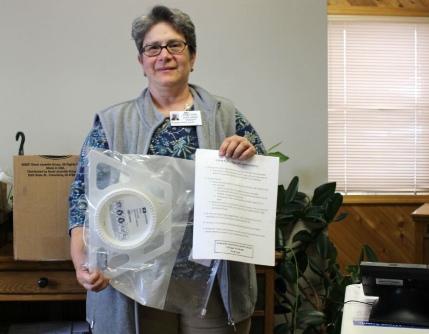 Kitty Basirico, the director of the Anaconda-Deer Lodge County health department, holds up a sample take-home kit for the free lead and arsenic testing. September 14, 2018.