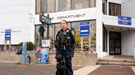 Officer Alysha Pirog and K-9 Frankie pose for a portrait outside the Bristol Police Department. Frankie joined the force in February after being trained for two years by an incarcerated “‘puppy raiser”’ at Bedford Hills Correctional Facility, as part of the Puppies Behind Bars program.