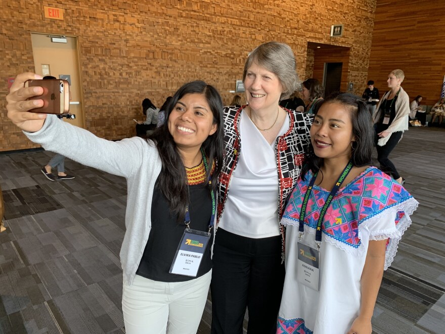 Helen Clark, former prime minister of New Zealand and gender equality champion, takes a selfie with attendees of the Women Deliver conference in Vancouver.