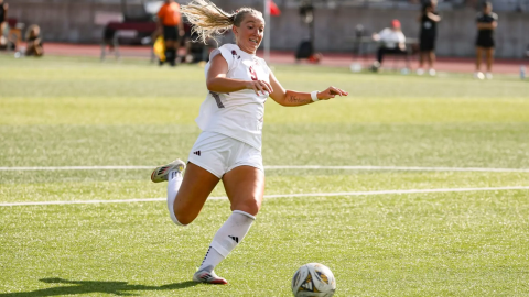 Macee McKenna dives for ball during 2025 match