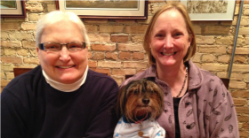 Marsha Caspar and Glenna DeJong with Frizzy. They were the first same-sex couple married in Michigan on March 22, 2014, after a federal judge struck down the state’s same-sex marriage ban. The ban was restored by the U.S. Sixth Circuit Court of Appeals before later being overturned by the U.S. Supreme Court.