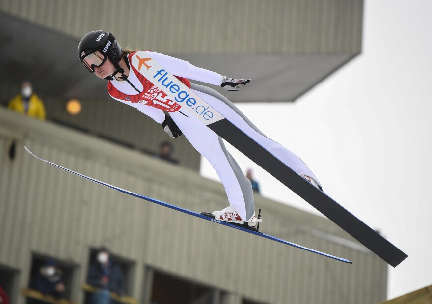 Anna Hoffmann soars during the women's ski jumping competition for placement on the 2022 U.S. Olympic team at the Olympic Ski Jumping Complex Saturday, Dec. 25, 2021, in Lake Placid, N.Y. [Hans Pennink / AP]