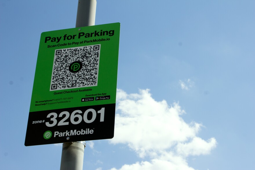 Paid parking sign in the Century II parking lot