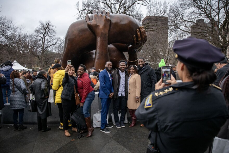 A monument to the Kings, 'The Embrace' is unveiled on Boston Common