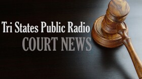 Judges Or Auctioneers Walnut Gavel And Sound Block On The Empty Black Table In The Back Light. Overhead View.
