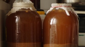 Home fermentation of kvass in glass jars.