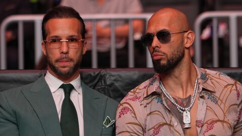 Andrew Tate, right, and his brother Tristan arrive an event, April 11, 2026, in Miami. 
