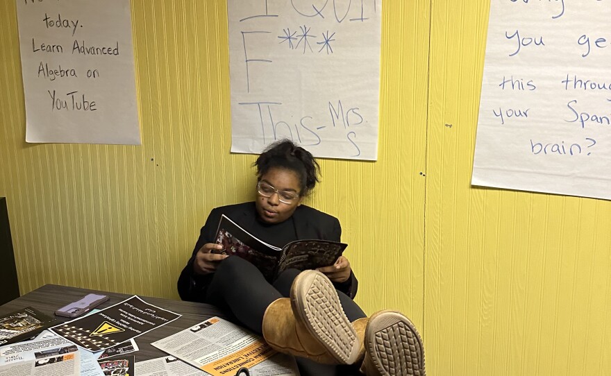 Student acting as a teacher in class.