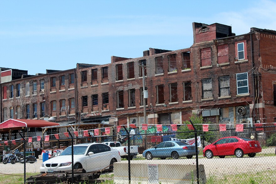 The east side of some of the buildings included in the North Broadway Wholesale and Warehouse District.