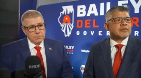 Republican Darren Bailey, left, and his running mate, Aaron Del Mar, take questions from reporters after winning the Republican nomination on primary night on March 17, 2026.