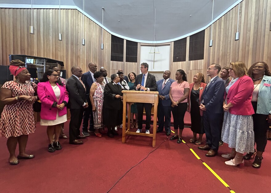Gov. Matt Meyer joins lawmakers at Shiloh Baptist Church in Wilmington to sign HB 444.