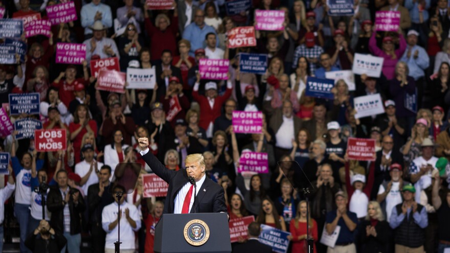 President Trump addresses the crowd during a rally in Houston in support of Texas Sen. Ted Cruz on Oct. 22,. During the rally, he described himself as a "nationalist," and encouraged his supporters to use the word.