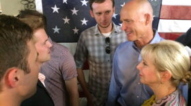 Governor Scott and his wife Ann talk to potentail voters at David's Real Pit BBQ in Gainesville after a rally to encourage early voting on Tuesday, October 28th, 2014.