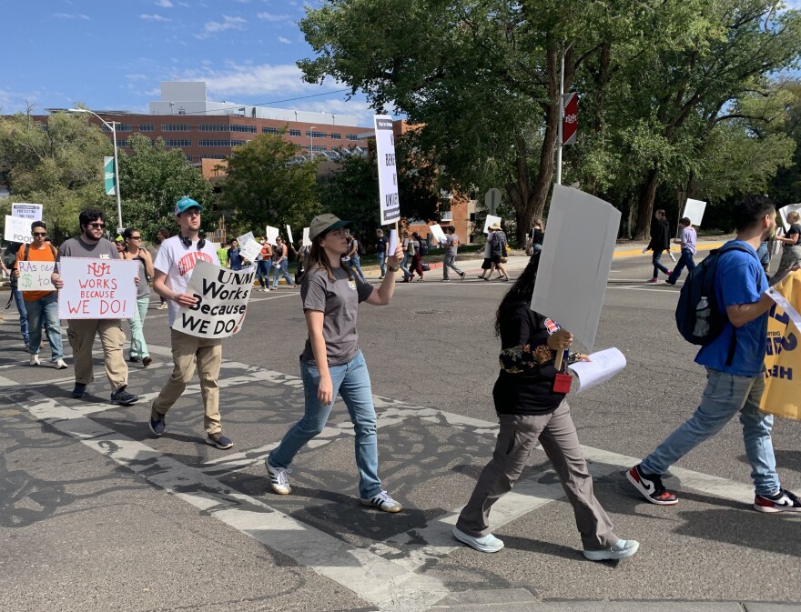 Members of the United Graduate Workers Local 1466 picket on the University of New Mexico campus on Oct. 3. The union has been in contract negotiations with UNM since April.