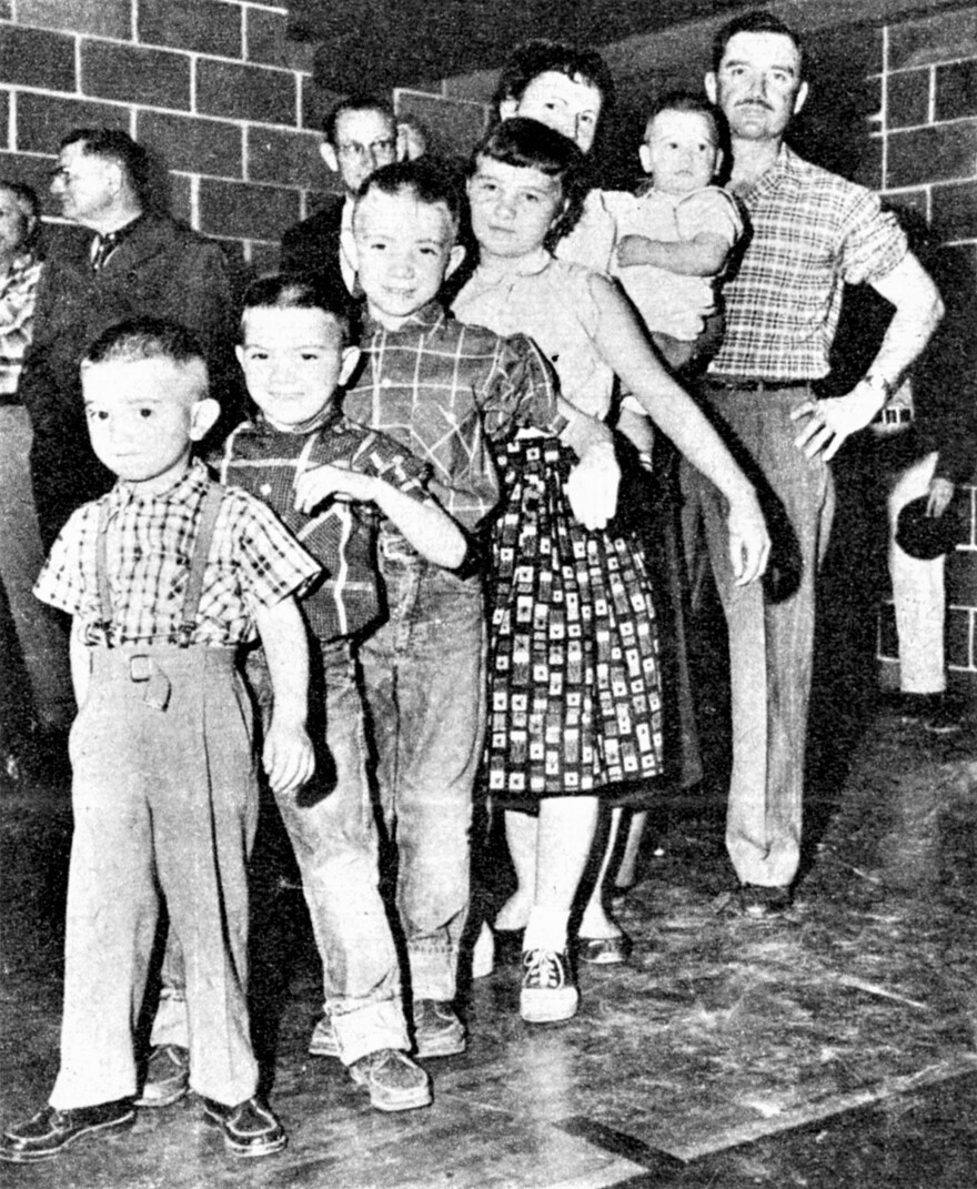 The Herd family of Protection, KS was chosen to ride on the main float in a parade celebrating the town becoming the first in the nation to be fully inoculated against polio.