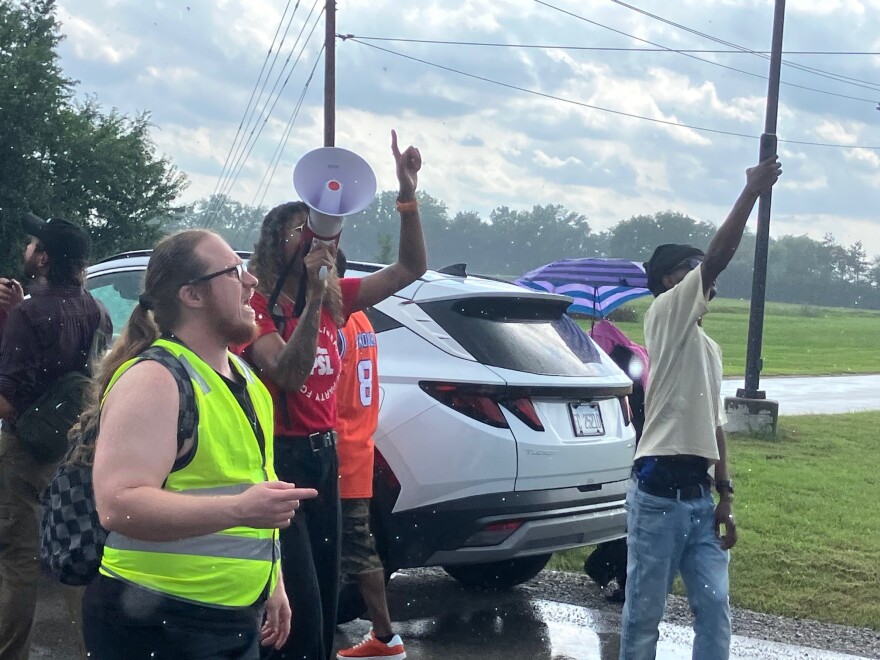 Organizer Deja Gaston led the march outside the Tyson Foods Joslin plant, which closed on Aug. 14, 2026.