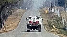 Liberty Mounds Fire truck rushes to another grass fire near 181st and Lewis.