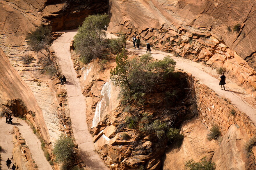 Visitors take on a series of switchbacks on a trail in Zion Canyon, Jan. 18, 2026. Zion needs around $17 million to take care of deferred maintenance for its trail system, as of 2025.