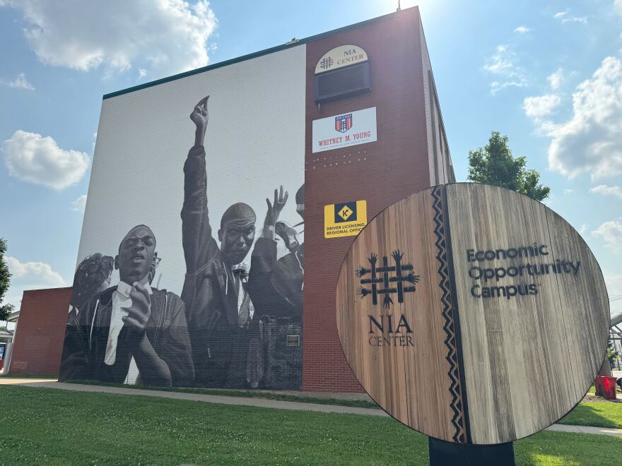 A mural and sign outside the Nia Center