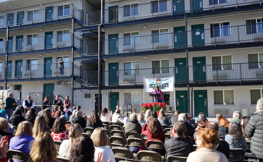 Flagstaff mayor Becky Daggett spoke at a gathered this week to celebrate the grand opening of the Flagstaff Shelter Services' Lantern project. The converted hotel will house more than 100 people struggling with homelessness.