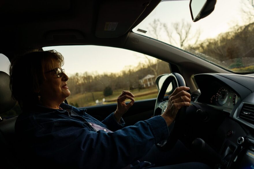 Gretchen drives through the outskirts of Waverly, Tenn., where homes weren’t affected by the flood.