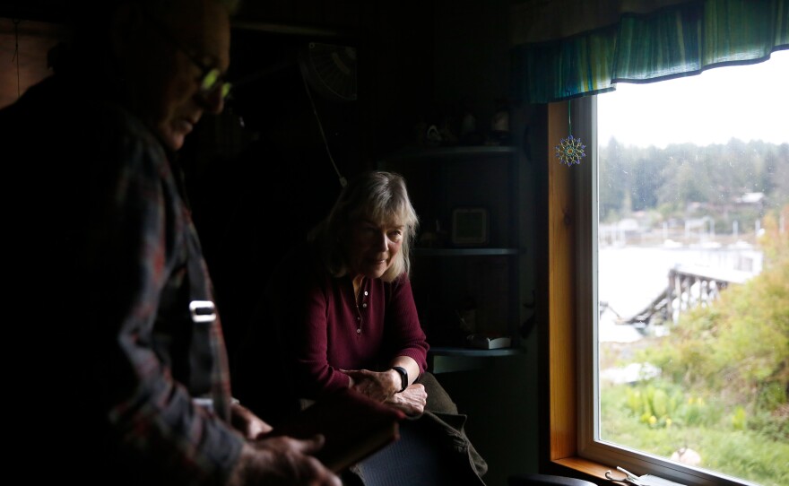 Steve and Cassy chat in their home.