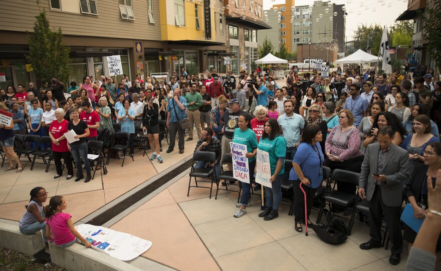 A crowd gathers during a community rally in support of DACA recipients on Tuesday, September 5, 2017, at El Centro De La Raza in Seattle.