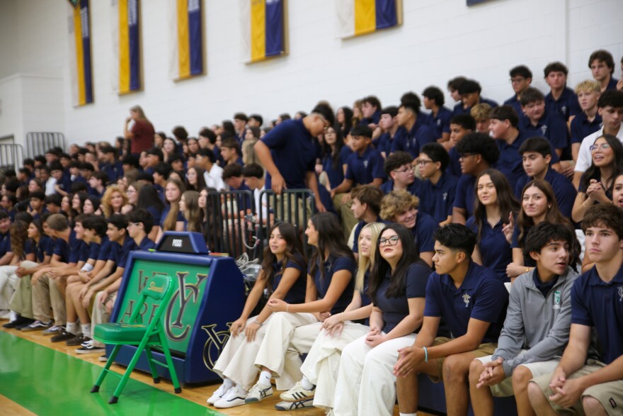 Yuma Catholic High School students gather inside the gym on the first day of classes, Aug. 5, 2026, for prayer.