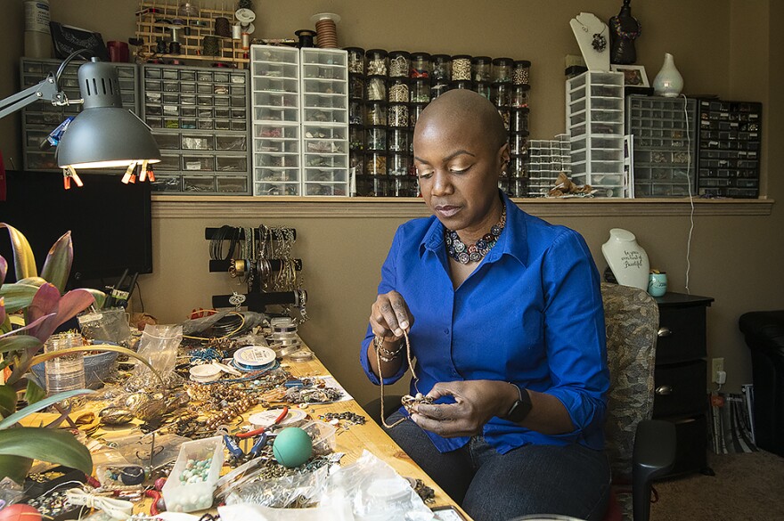 Jewelry designer Clarissa Knighten creates one-of-a-kind jewelry with artistic wire, gemstones and other found items.