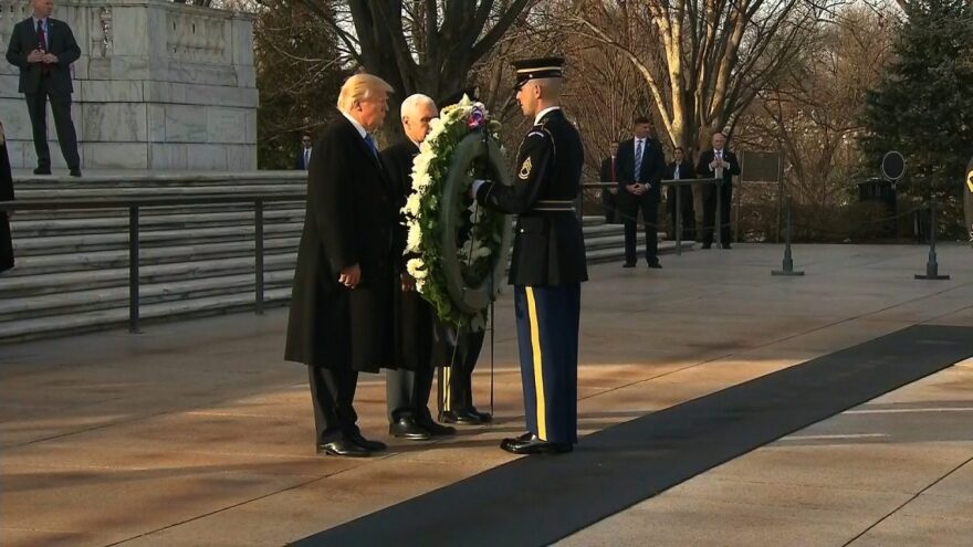 Donald Trump placed the wreath at Arlington National Cemetery in one of the kick-off ceremonial events in advance of his inauguration at the Capitol on Friday. Flanked by Mike Pence and standing before his children and families, Trump laid the wreath at the Tomb of the Unknowns in Arlington, Virginia.