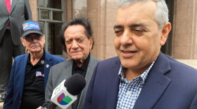 FILE - Former U.S. Rep. David Rivera speaks with media outside a federal court in Miami, Dec. 20, 2022.