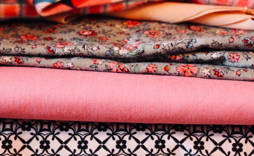  Stack of different patterns of fabric