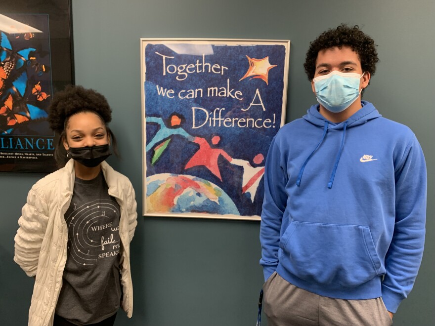  Devin & Destiny pose next to one of Huntley Middle School's many inspirational signs