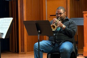 Trumpet player Aaron Smith talks beginnings, returns, and ‘Wicked’