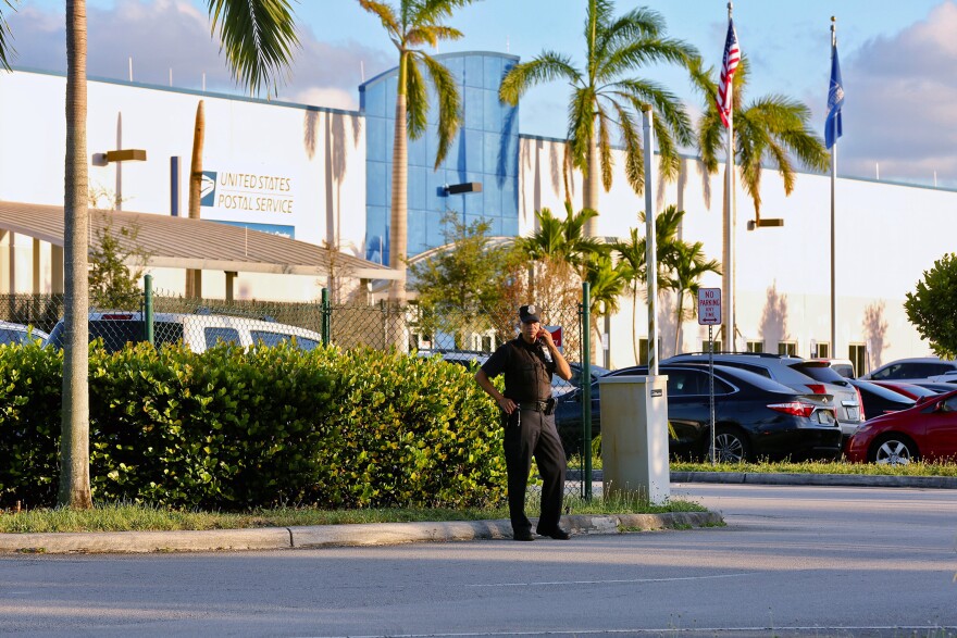 Police outside the U.S. Post Office Royal Palm Processing & Distribution Center, in Opa-locka, Fla., on Thursday. At least one of the recovered packages passed through the center.