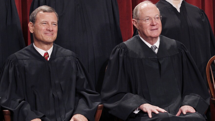 Chief Justice John G. Roberts (left) and Associate Justice Anthony M. Kennedy.