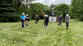 Community partners break ground on the East Bluff Community Homes project, making sure to stay mindful of social distancing. The project, led by the Peoria Opportunities Foundation, will bring 30 affordable rental units to the neighborhood.