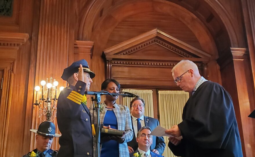 Springfield, Massachusetts, Police Commissioner Cheryl Clapprood takes the oath from District Court Judge John Payne during her swearing-in ceremony, in October 2019.