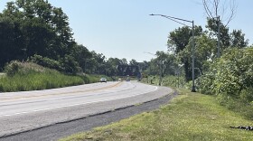 The Loop the Lake trail would follow Onondaga Lake Parkway and go under the railroad bridge.
