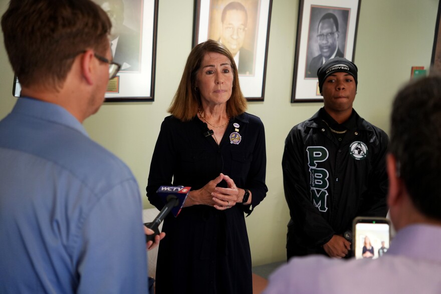 Florida Democratic Lt. Gov. candidate Gwen Graham listens to a question from the press after she voted in the state's primary election.