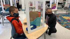 A fourth grader at Dr. Weeks Elementary School with Syracuse Superintendent Jaime Alicea. TOM MAGNARELLI / WRVO PUBLIC MEDIA FILE PHOTO