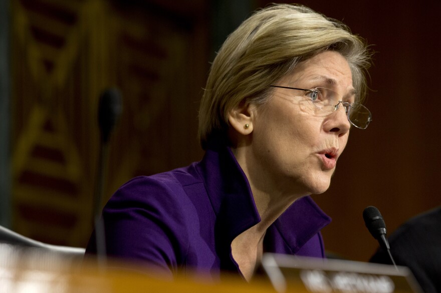 Sen. Elizabeth Warren, D-Mass., at a hearing of the Senate Banking, Housing and Urban Affairs Committee last year. Her book, <em>A Fighting Chance</em>, comes out next week.