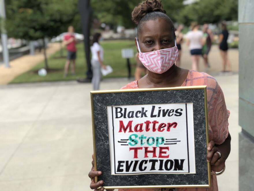 Stephanie Wilder of Durham takes part in protest against evictions outside the Durham County Courthouse. She fears eviction.