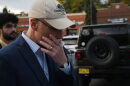 Brent Taylor answers reporter questions while walking into a GOP campaign rally on Tuesday, Oct. 27, 2026.