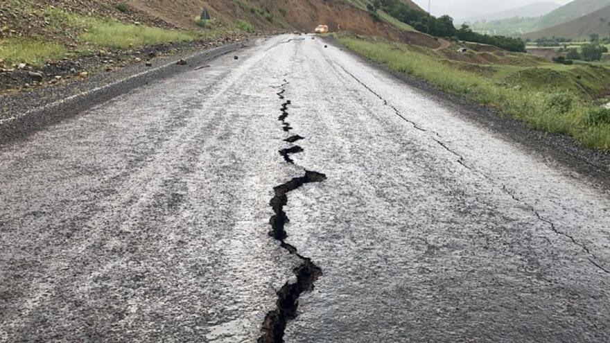 Earthquake damage on road.