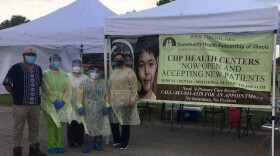 Staff with the Champaign branch of the Community Health Partnership of Illinois have been running outdoor mobile clinics offering free COVID-19 testing and health risk assessments for migrant workers.