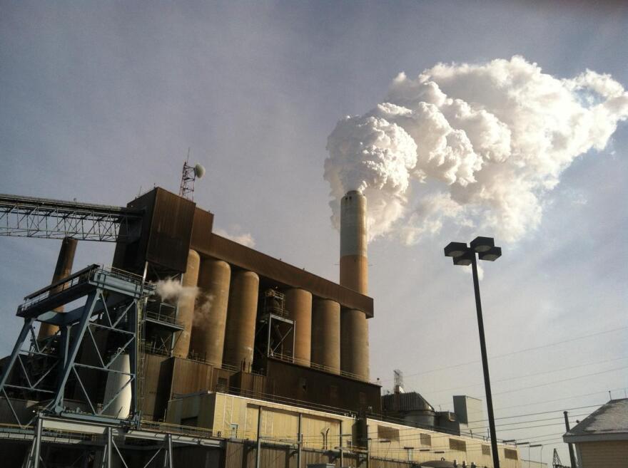 A plume of steam billows from the coal-fired Merrimack Station in Bow, N.H. in January 2015.