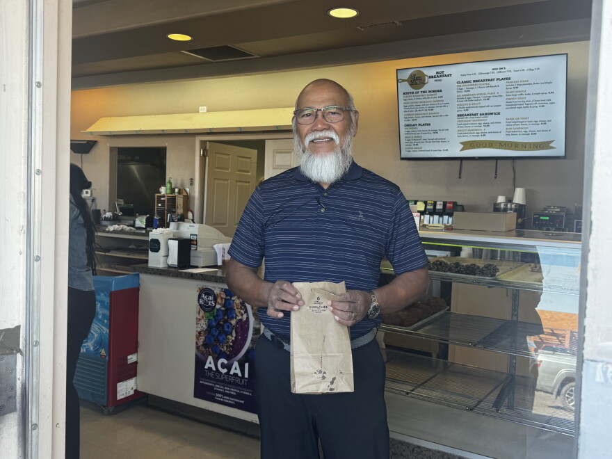 Chito Fernandez is making his last purchase of donuts.