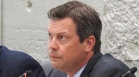 Sen. Kyle Walker listens during a 2025 committee hearing.