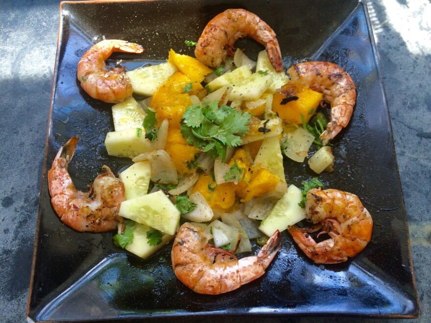 Kathy's spicy grilled mango and cucumber salad with grilled shrimp. (Kathy Gunst for Here & Now)